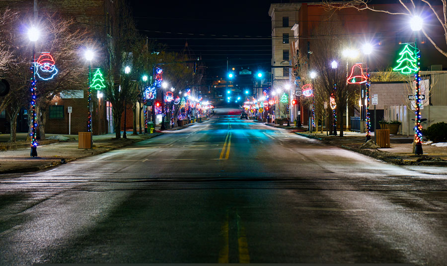 Lighted Street Poles And Window Displays On Main Street